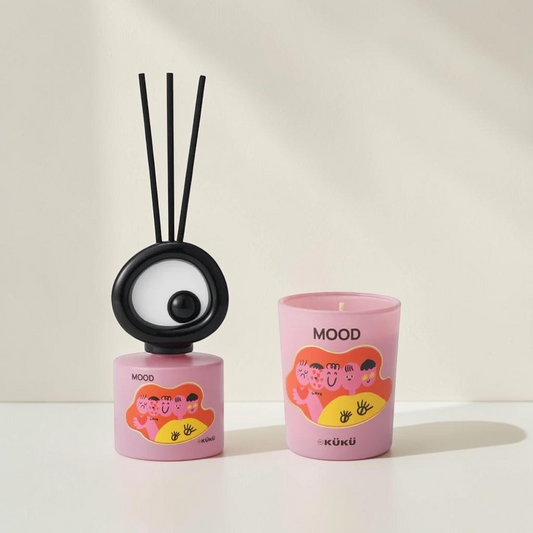 Good Bounty WEKÜKÜ Mood tomato leaf scented candle and fragrance diffuser set in pink illustrated Big Eye vessels