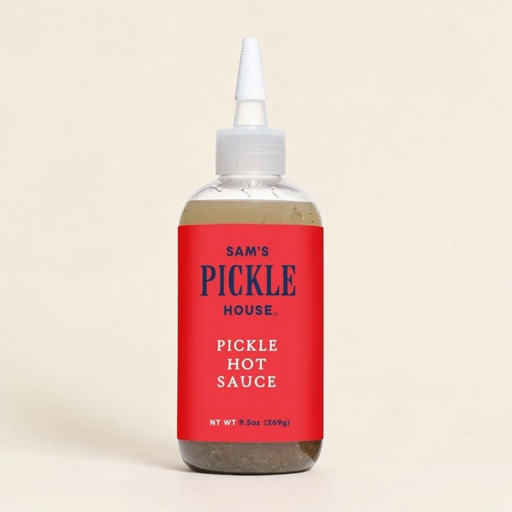 Good Bounty Sam's Pickle House Pickle Hot Sauce in a clear 9.5 oz squeeze bottle with a vibrant red label.