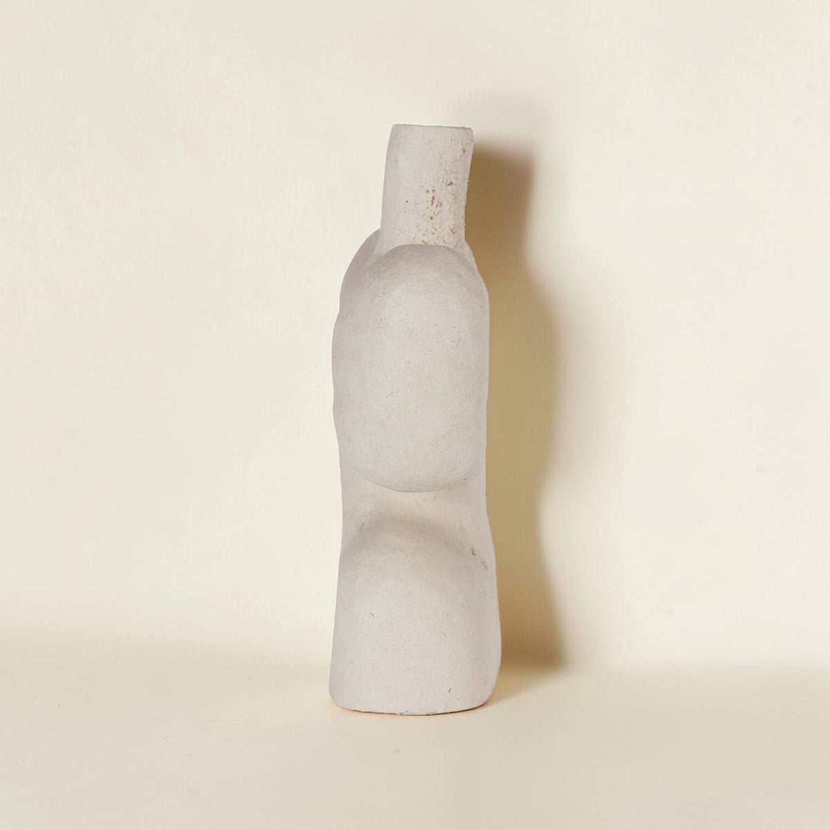 Good Bounty Aliya paper mache vessel in white with a unique sculptural shape and textured fibrous finish